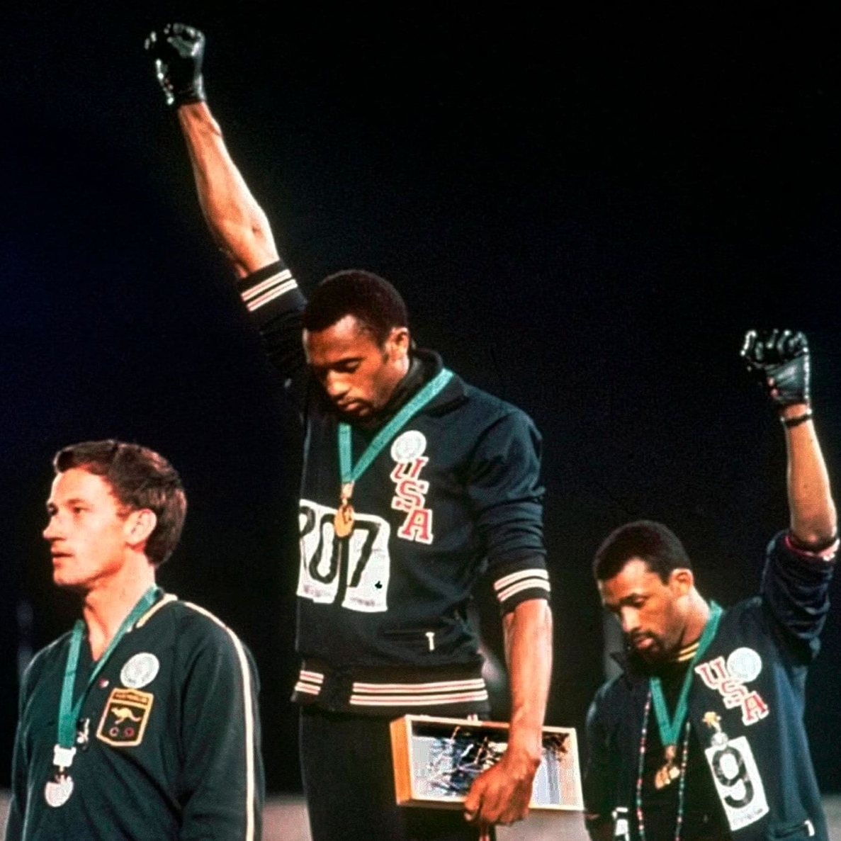 Tommie Smith raises a black power fist at the 1968 Mexico City Olympics