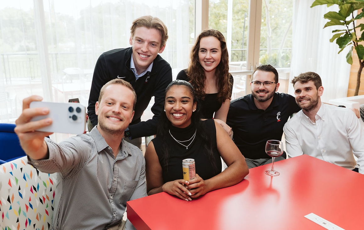 Group of alumni taking a selfie